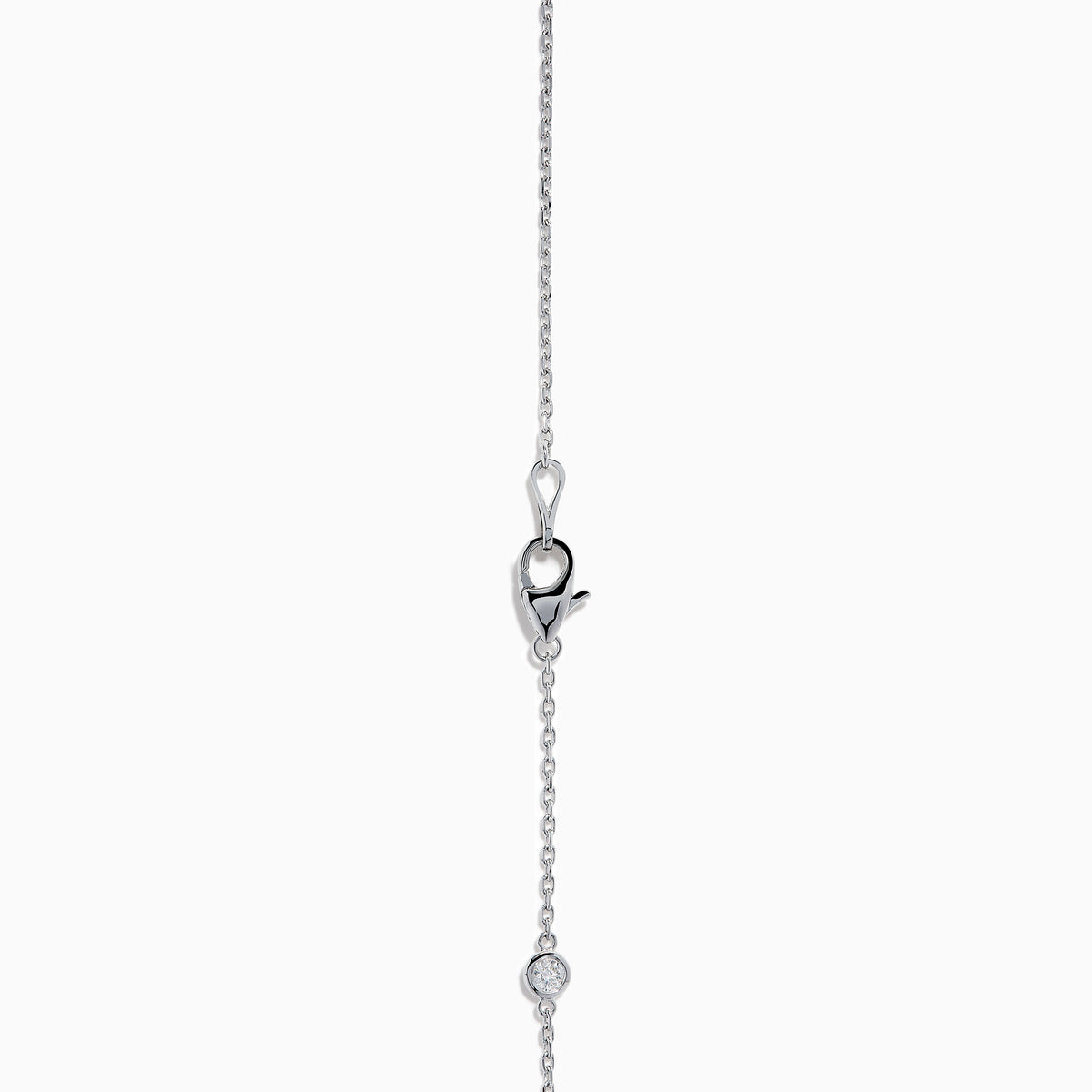 The 14K White Gold Diamond Station Necklace, 1.00 TCW, features evenly spaced round diamonds along a fine chain and is secured with a lobster clasp.