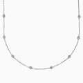 The 14K White Gold 36 Inch 2.00ct Diamond Station Necklace showcases round bezel-set diamonds evenly spaced along a fine chain, presented on a plain white background.