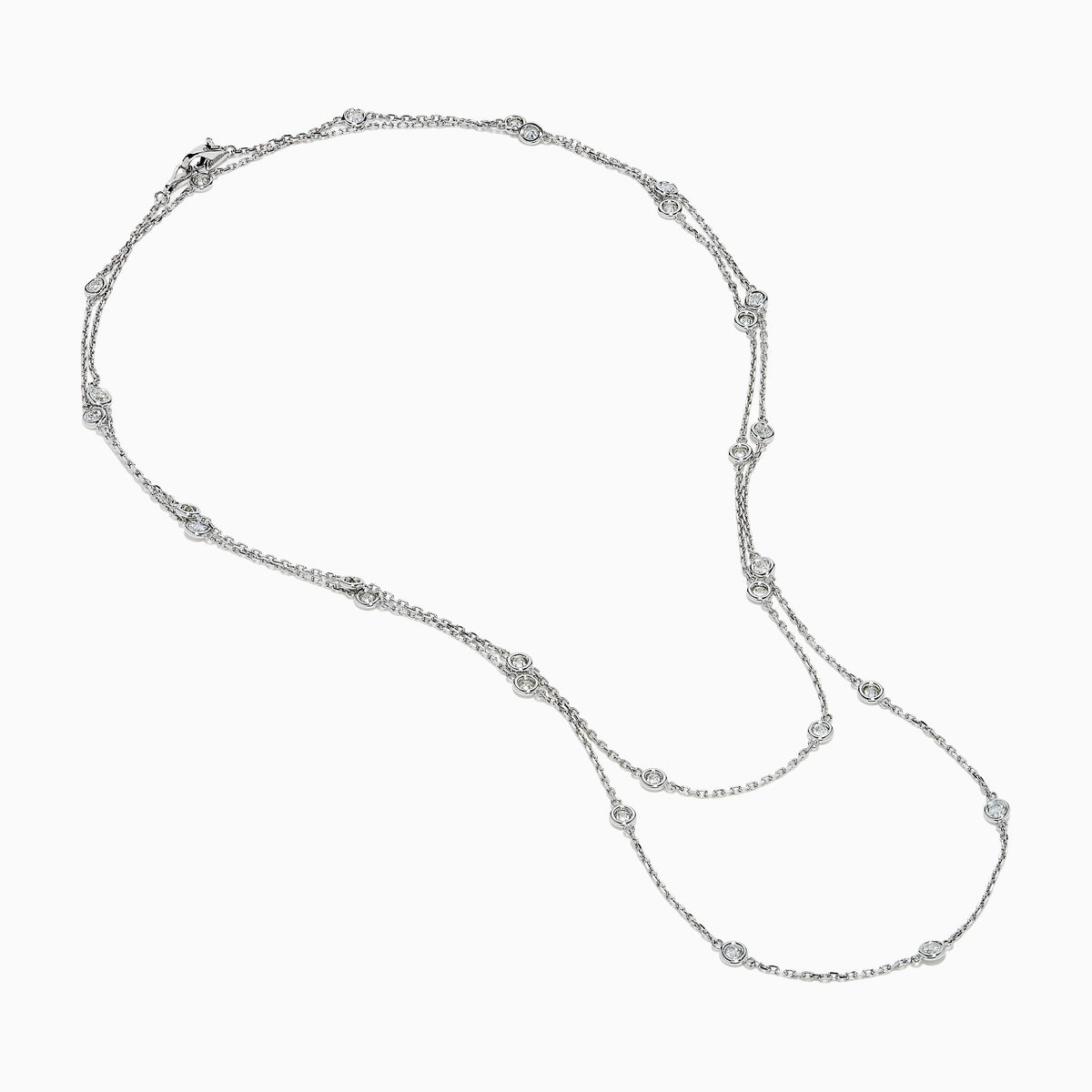 The 14K White Gold 36 Inch 2.00ct Diamond Station Necklace showcases round bezel-set diamonds evenly spaced along a fine chain, presented on a plain white background.