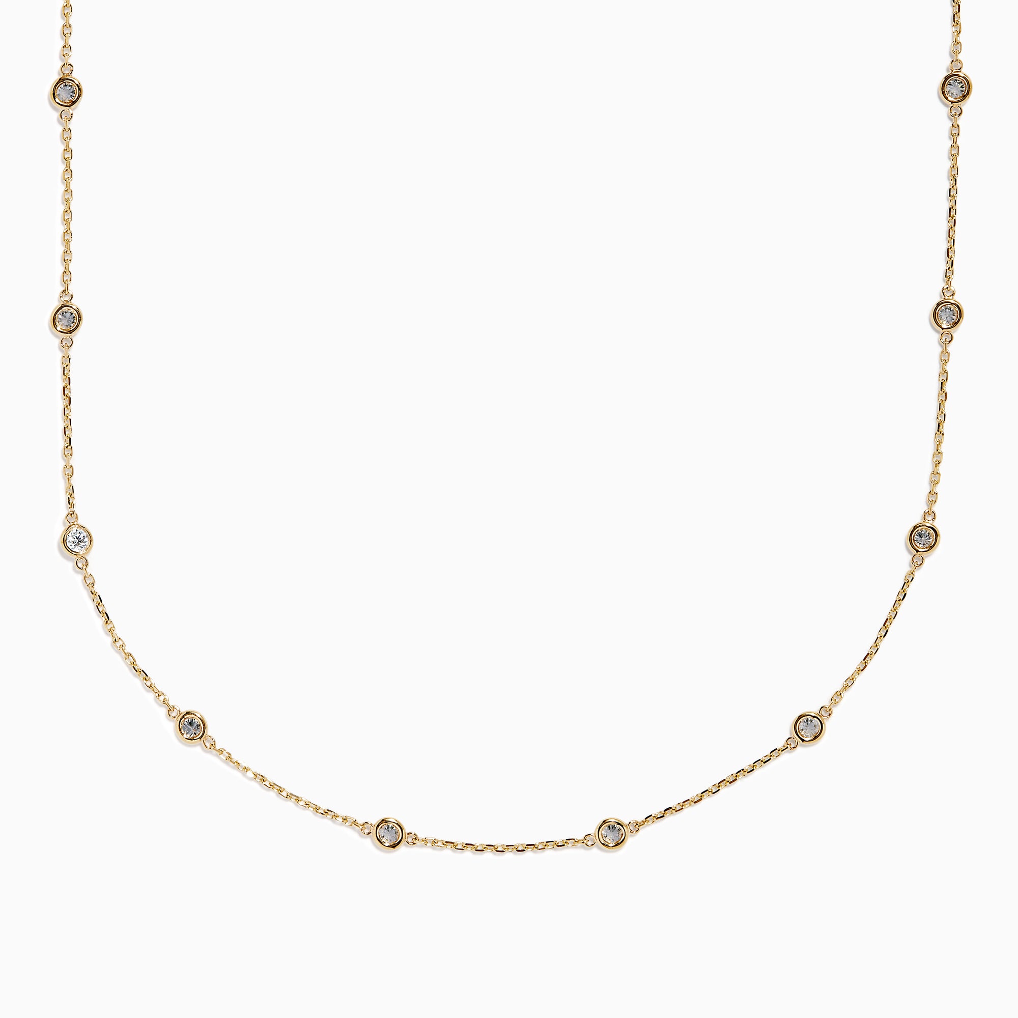 The 14K Yellow Gold Diamond Station Necklace, 1.00 TCW, features evenly spaced round diamonds in bezel settings on a delicate gold chain, shown elegantly against a white background.