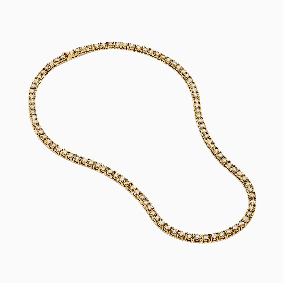 The 14K Yellow Gold Miracle Set Diamond Tennis Necklace, featuring an intricate pattern and embedded diamonds, is displayed against a white background.