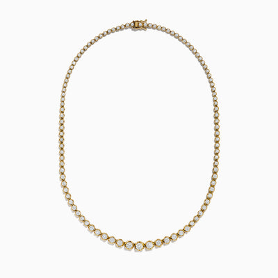 The 14K Yellow Gold Miracle Set Diamond Graduated Tennis Necklace showcases a single row of closely set, sparkling round diamonds in a gentle curve on yellow gold.