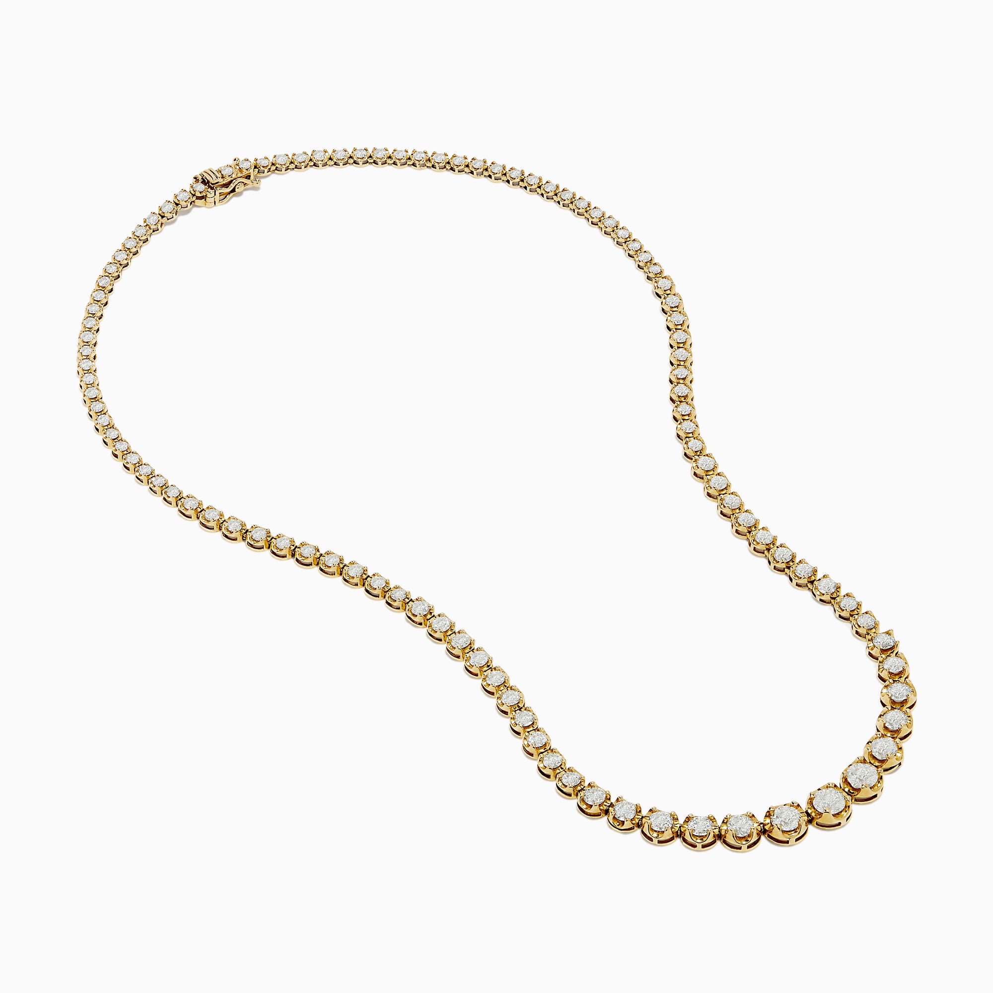 The 14K Yellow Gold Miracle Set Diamond Graduated Tennis Necklace showcases a single row of closely set, sparkling round diamonds in a gentle curve on yellow gold.