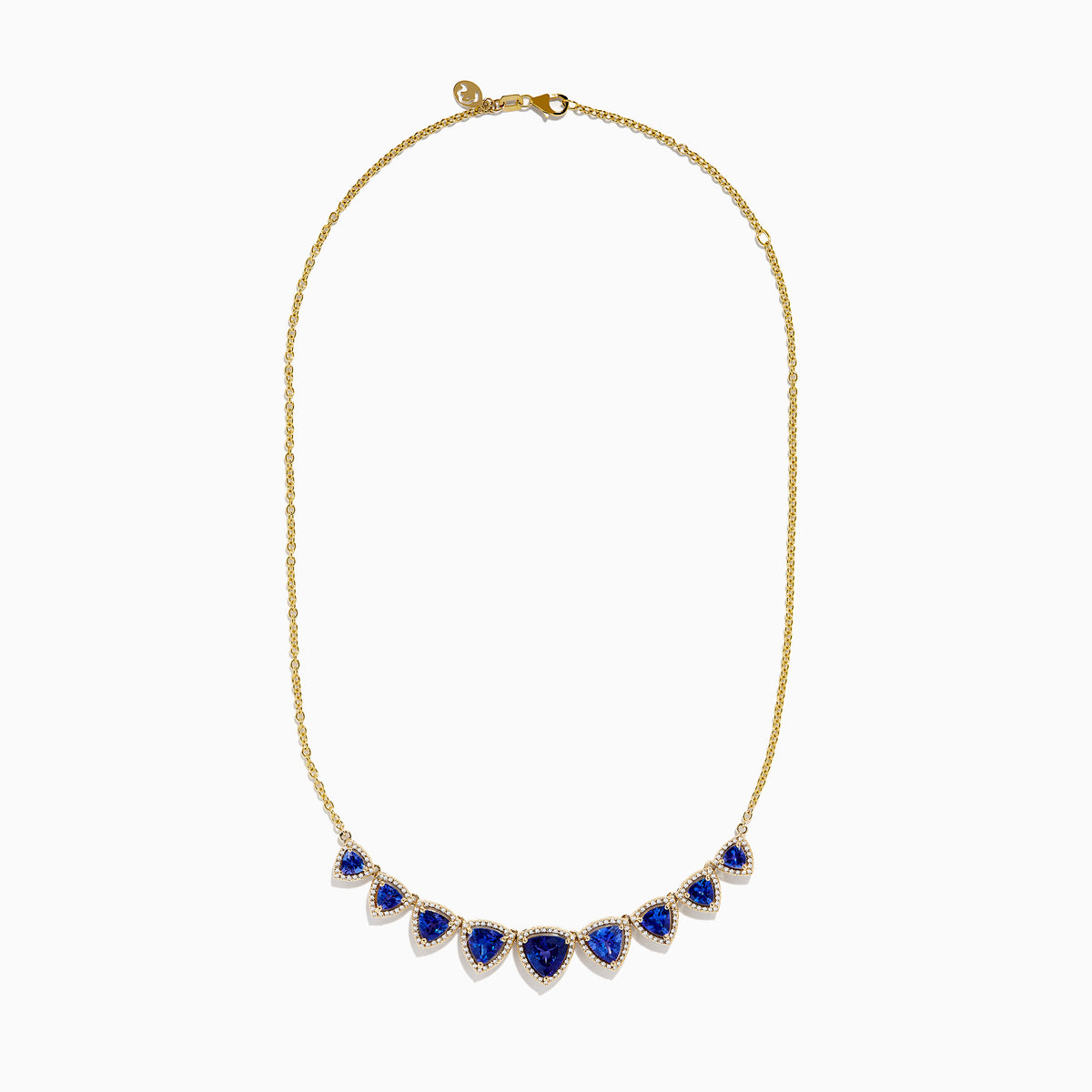 The Nahla 14K Yellow Gold Trillion Tanzanite and Diamond Necklace showcases seven deep blue trillion tanzanites, each framed by diamonds and evenly spaced along the chain.