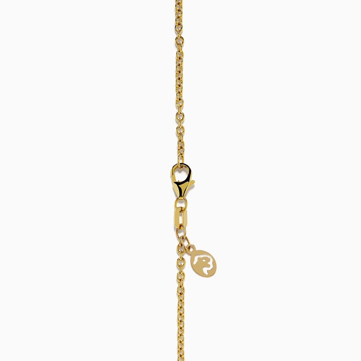 The Nahla 14K Yellow Gold Trillion Tanzanite and Diamond Necklace showcases seven deep blue trillion tanzanites, each framed by diamonds and evenly spaced along the chain.
