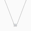 The Lab Grown Diamond Emerald Cut 1.00ct Solitaire Necklace in 14K White Gold features a sparkling emerald-cut diamond pendant, elegantly centered on a delicate white gold chain and displayed against a plain white background.
