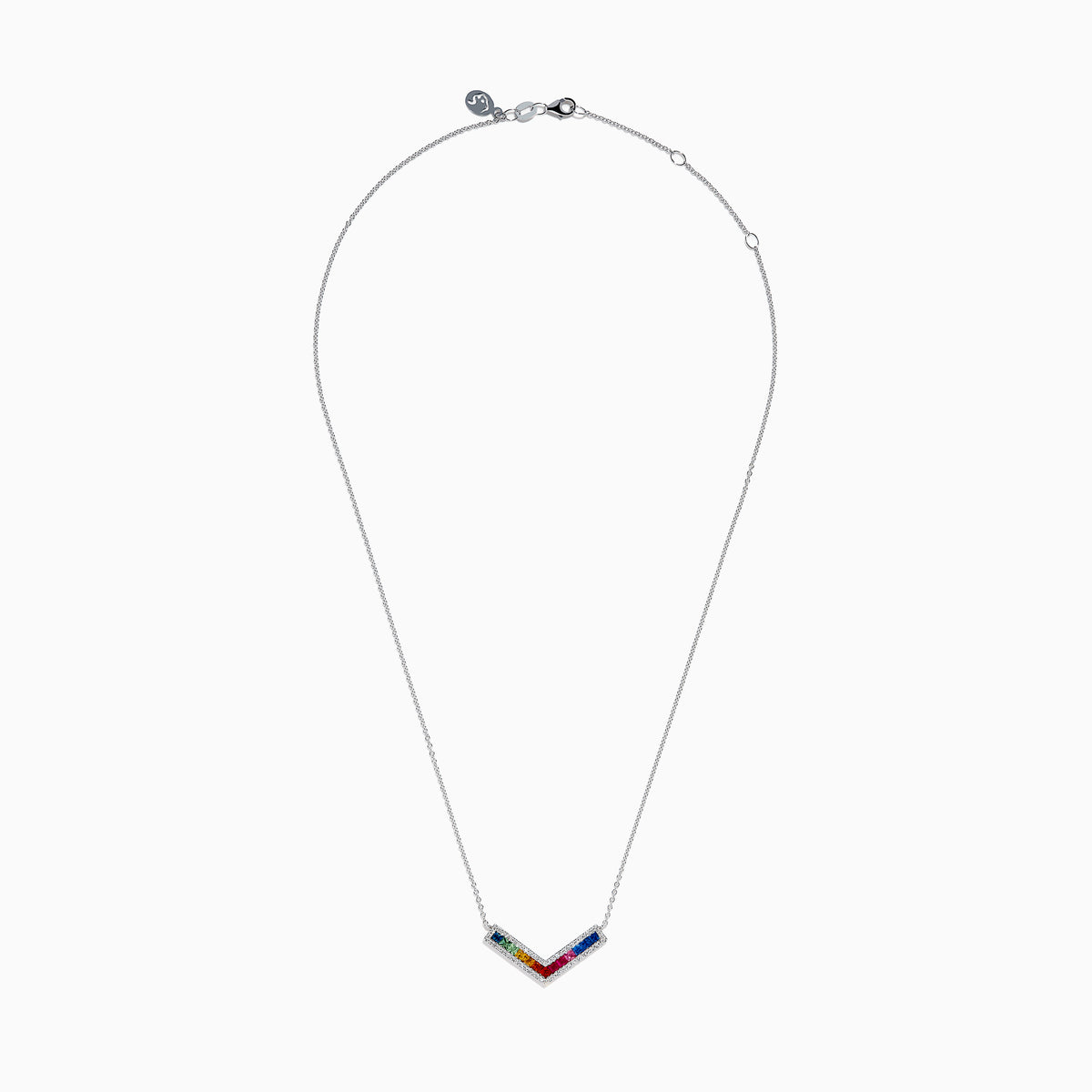 The Watercolors 14K White Gold Multi Sapphire and Diamond Collarbone Necklace features a V-shaped pendant with square, multicolored sapphires in a rainbow pattern, bordered by sparkling diamonds.