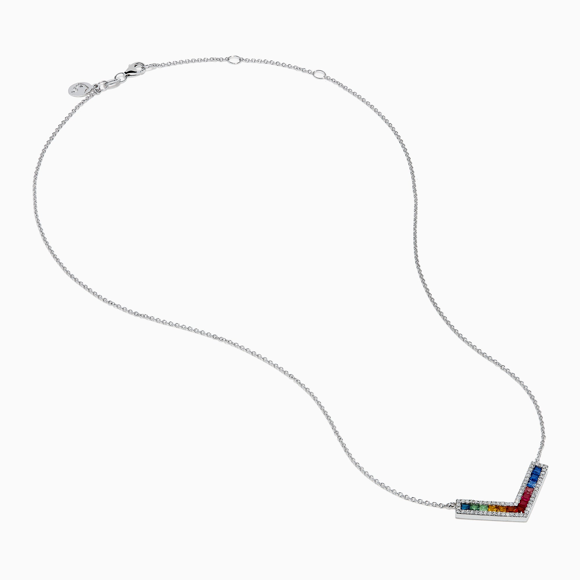 The Watercolors 14K White Gold Multi Sapphire and Diamond Collarbone Necklace features a V-shaped pendant with square, multicolored sapphires in a rainbow pattern, bordered by sparkling diamonds.