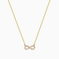 The 14K Yellow Gold Pavé Diamond Infinity Necklace features a horizontal infinity symbol pendant adorned with tiny clear pavé diamonds.