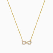 The 14K Yellow Gold Pavé Diamond Infinity Necklace features a horizontal infinity symbol pendant adorned with tiny clear pavé diamonds.