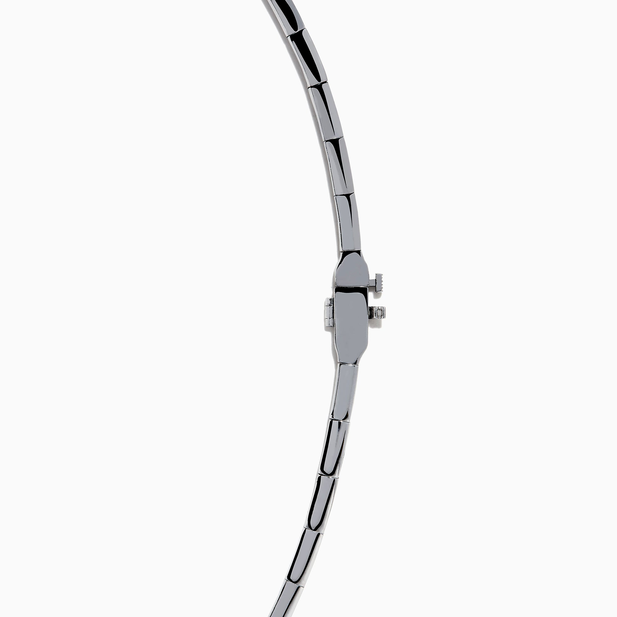 The 14K White Gold Tanzanite and Diamond Collar Necklace showcases a row of vivid blue tanzanites edged with sparkling diamonds on a sleek curved band, elegantly displayed against a white background.