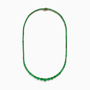 The Brasillica 14K Yellow Gold Emerald Graduated Eternity Necklace features a continuous row of oval emeralds set in yellow gold, displayed against a white background.