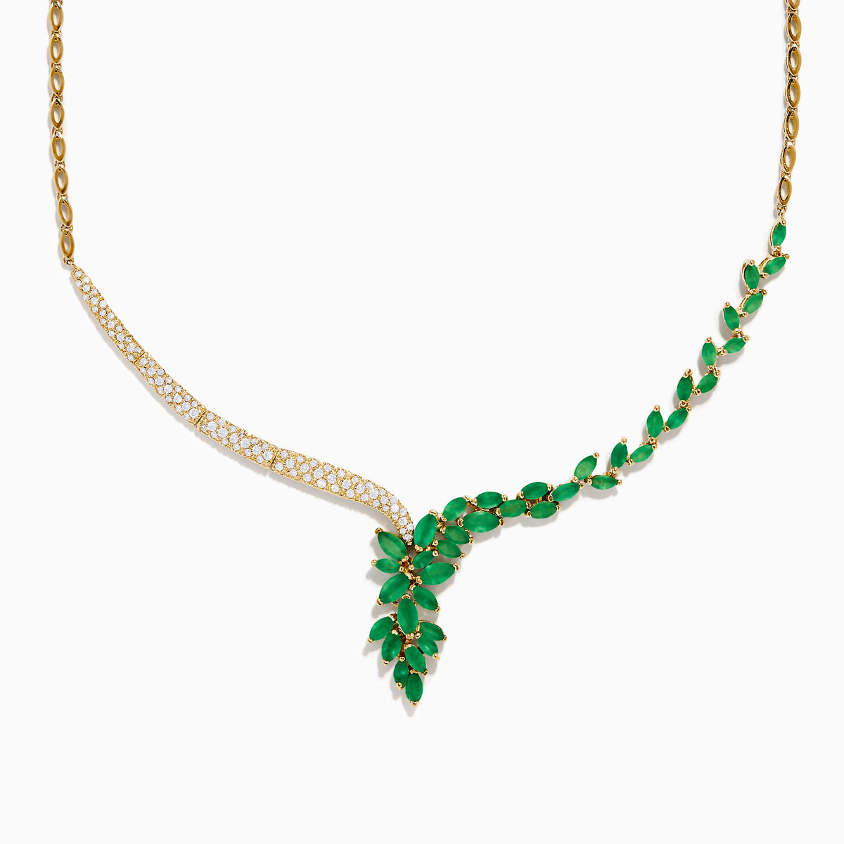 The Brasilica 14K Yellow Gold Emerald and Diamond Statement Necklace features an elegant leaf-shaped emerald on one side and sparkling diamonds on the other, meeting in a radiant V-shape at the center.