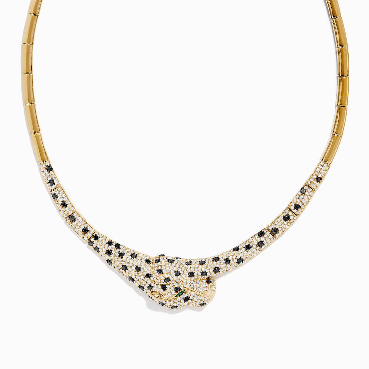 The Signature 14K Yellow Gold Emerald, Black and White Diamond Necklace features a panther-inspired design with a gold body encrusted in black and white diamonds for a stunning spotted pattern, accented by vivid emerald eyes.