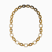 The D'Oro 14K Yellow Gold Diamond Necklace features rectangular links, some adorned with sparkling diamonds, displayed on a white background.