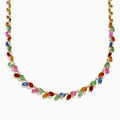 The Watercolors 14K Yellow Gold Multi Sapphire and Diamond Necklace features sapphires in pink, green, orange, blue, and red arranged in a delicate, symmetrical design along the chain.
