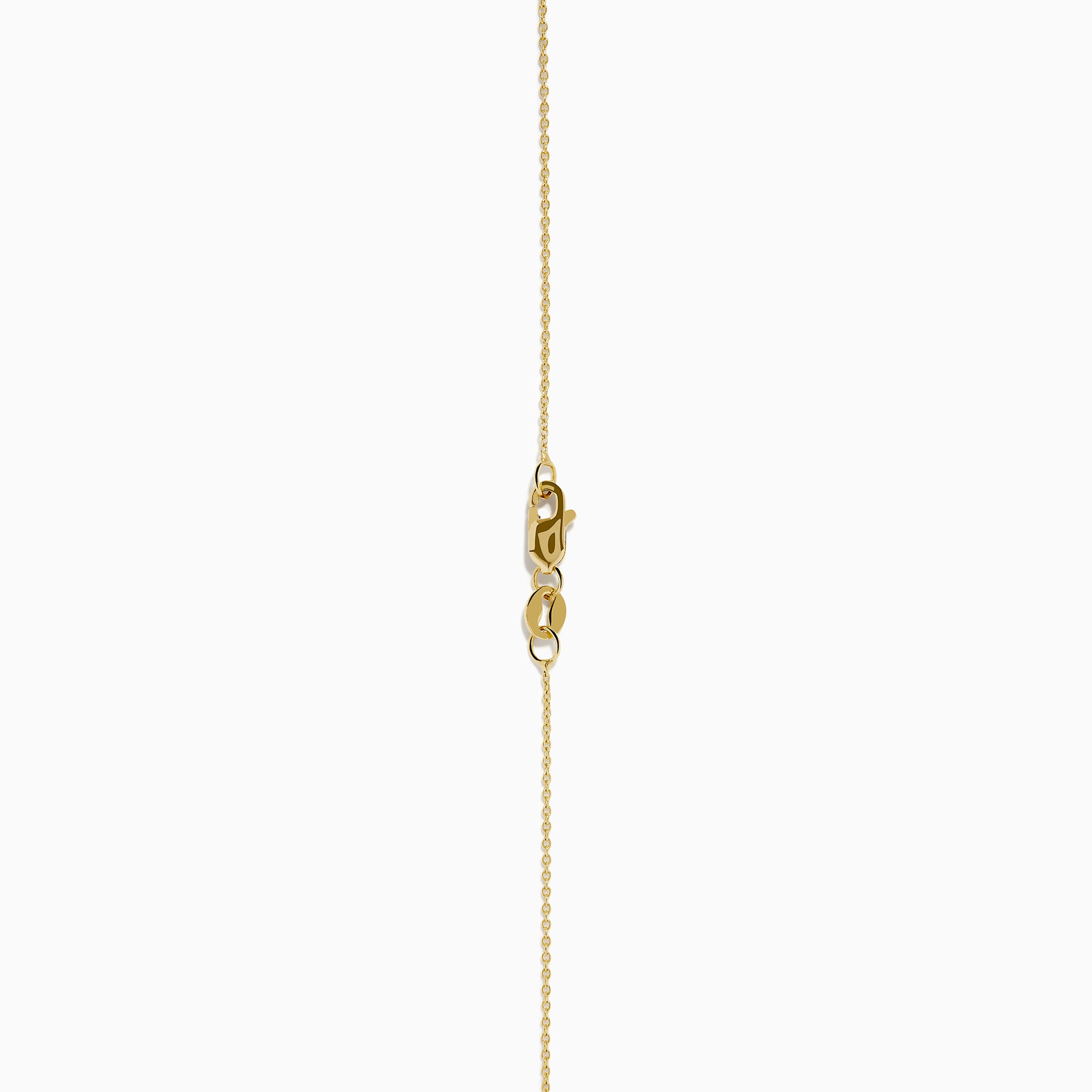 The Nahla 14K Yellow Gold Tanzanite Pendant features a teardrop blue tanzanite surrounded by diamonds and a diamond-accented bail, gleaming at the center of this elegant necklace.