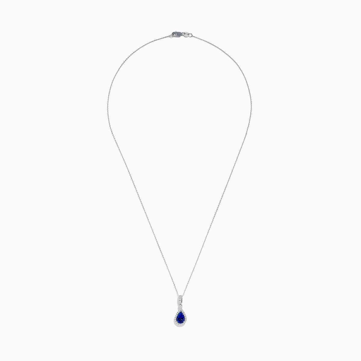 The Nahla 14K White Gold Tanzanite Pendant features a teardrop-shaped blue tanzanite accented by small white stones, set in 14K white gold and suspended from a delicate chain.