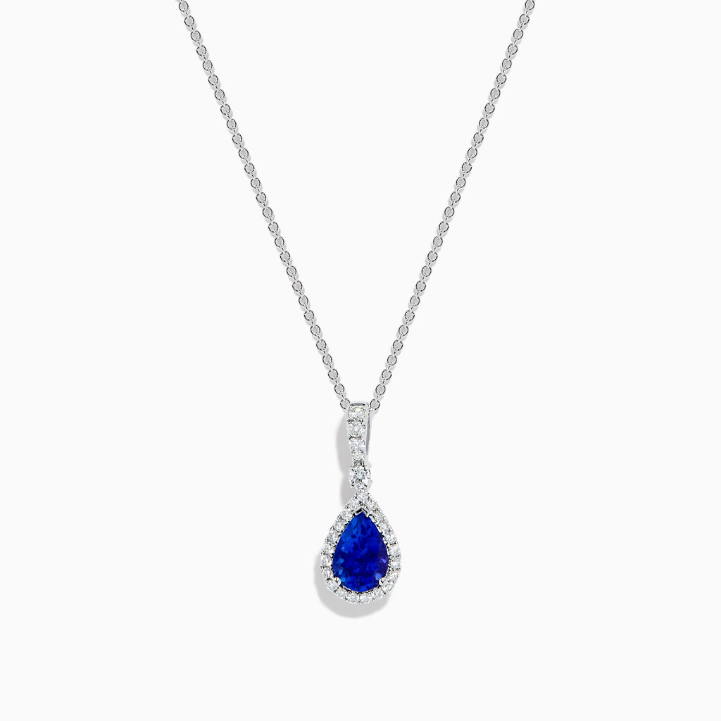 The Nahla 14K White Gold Tanzanite Pendant features a teardrop-shaped blue tanzanite accented by small white stones, set in 14K white gold and suspended from a delicate chain.