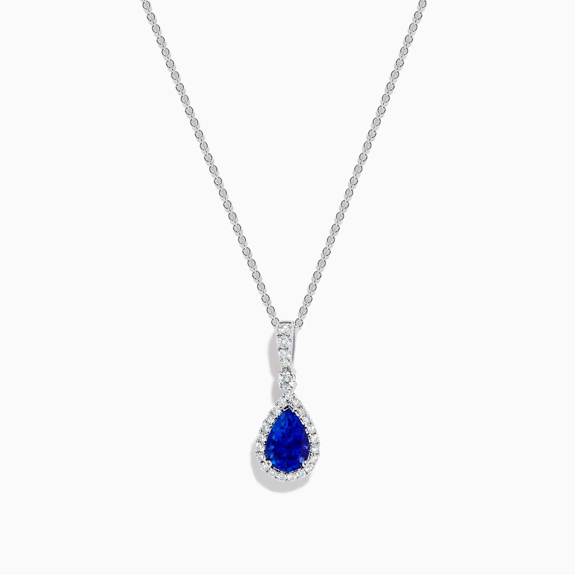 The Nahla 14K White Gold Tanzanite Pendant features a teardrop-shaped blue tanzanite accented by small white stones, set in 14K white gold and suspended from a delicate chain.