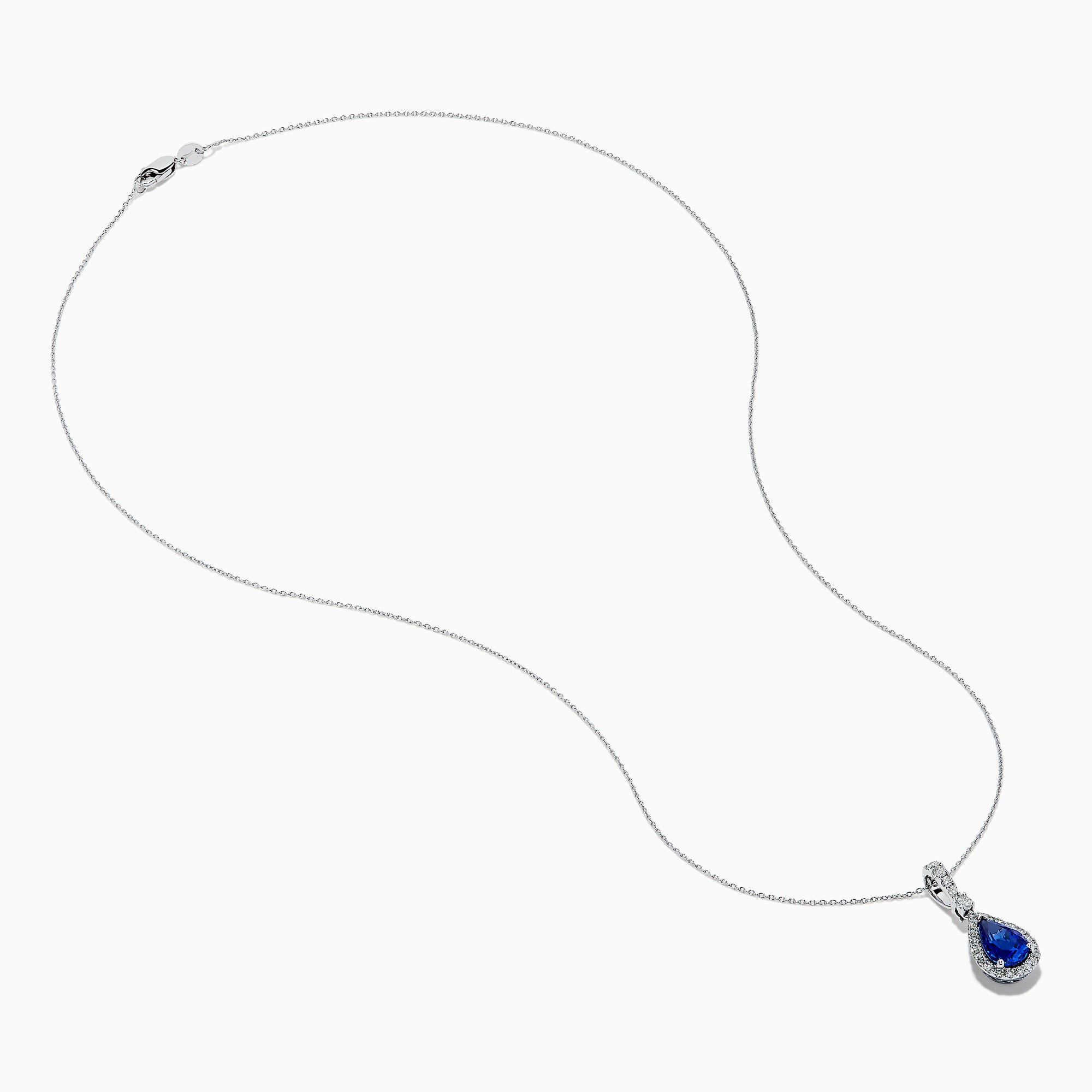 The Nahla 14K White Gold Tanzanite Pendant features a teardrop-shaped blue tanzanite accented by small white stones, set in 14K white gold and suspended from a delicate chain.