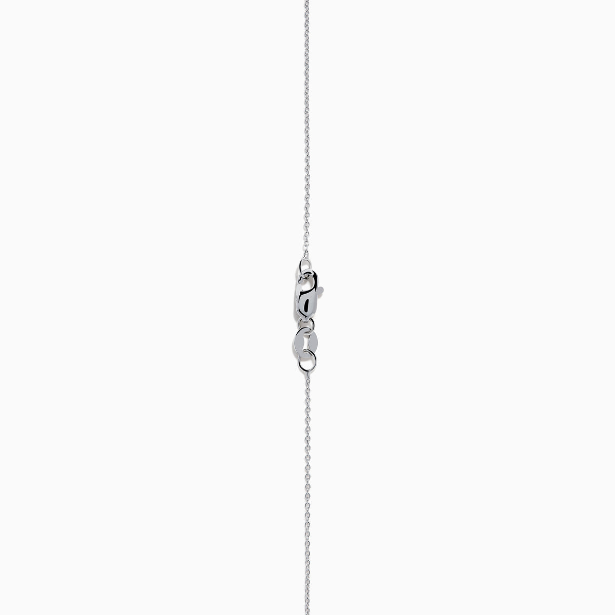 The Nahla 14K White Gold Tanzanite Pendant features a teardrop-shaped blue tanzanite accented by small white stones, set in 14K white gold and suspended from a delicate chain.