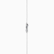 The Nahla 14K White Gold Tanzanite Pendant features a teardrop-shaped blue tanzanite accented by small white stones, set in 14K white gold and suspended from a delicate chain.