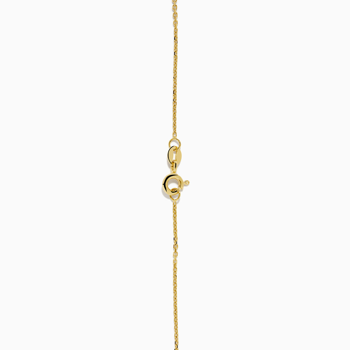 The 14K Yellow Gold Emerald and Diamond Necklace showcases alternating round emerald and diamond stones set in a gentle curve at the center.