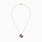 The 14 Karat Three Tone Gold Semi Precious and Diamond Butterfly Pendant Necklace showcases a butterfly pendant with pink, red, blue, and clear stones, plus a round gemstone accent on the chain. The butterfly is tilted for added elegance.