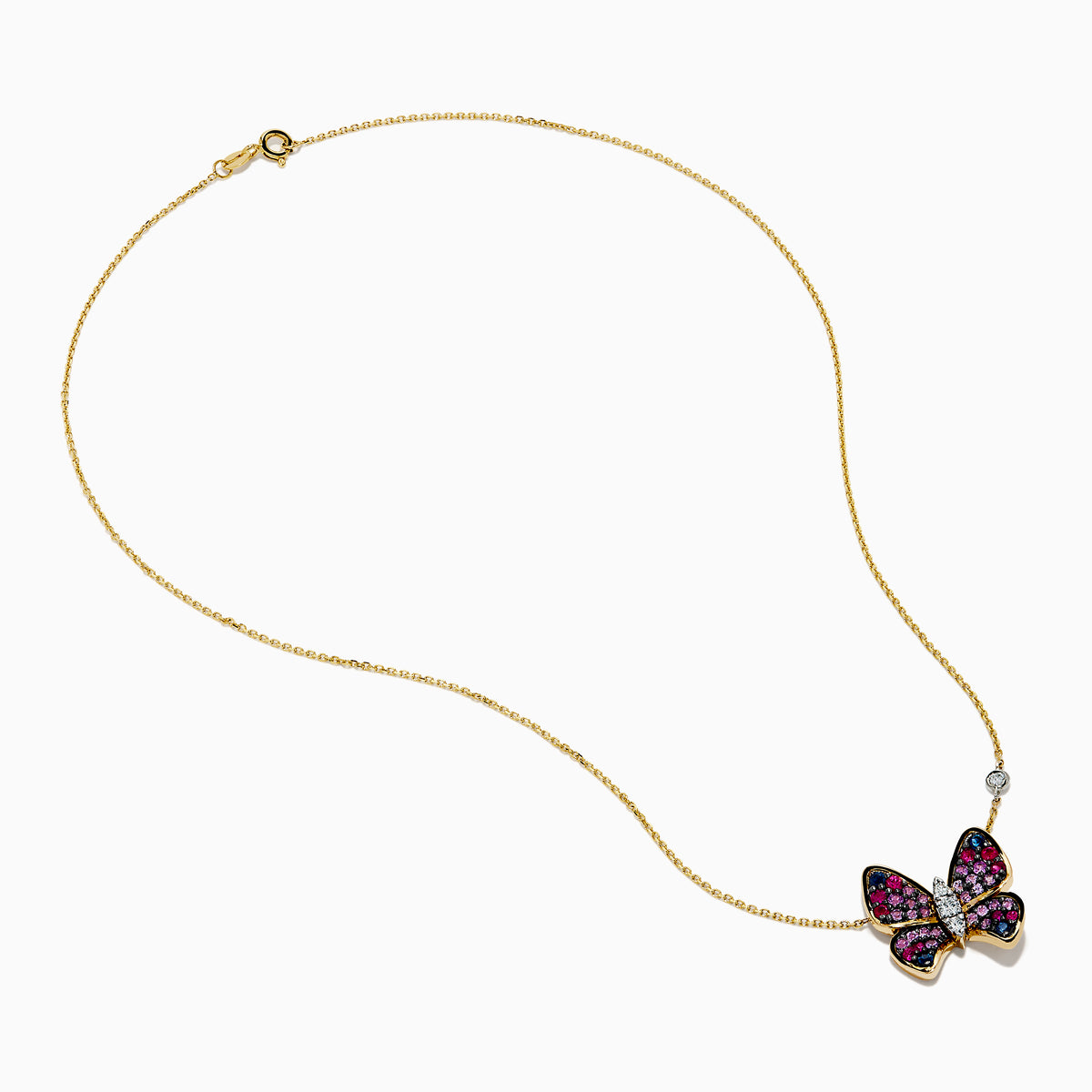 The 14 Karat Three Tone Gold Semi Precious and Diamond Butterfly Pendant Necklace showcases a butterfly pendant with pink, red, blue, and clear stones, plus a round gemstone accent on the chain. The butterfly is tilted for added elegance.