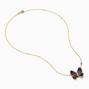 The 14 Karat Three Tone Gold Semi Precious and Diamond Butterfly Pendant Necklace showcases a butterfly pendant with pink, red, blue, and clear stones, plus a round gemstone accent on the chain. The butterfly is tilted for added elegance.
