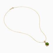 The 14K Yellow Gold Periodt and Diamond Pendant features a square-cut green gemstone and a vertical row of small white diamonds above it, creating an elegant and stylish necklace.