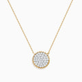 Elegant and minimalistic, the DOro 14K Yellow Gold Diamond Cluster Disc Necklace features a thin chain and a round pendant with sparkling diamonds, bordered by a delicate gold beaded edge.