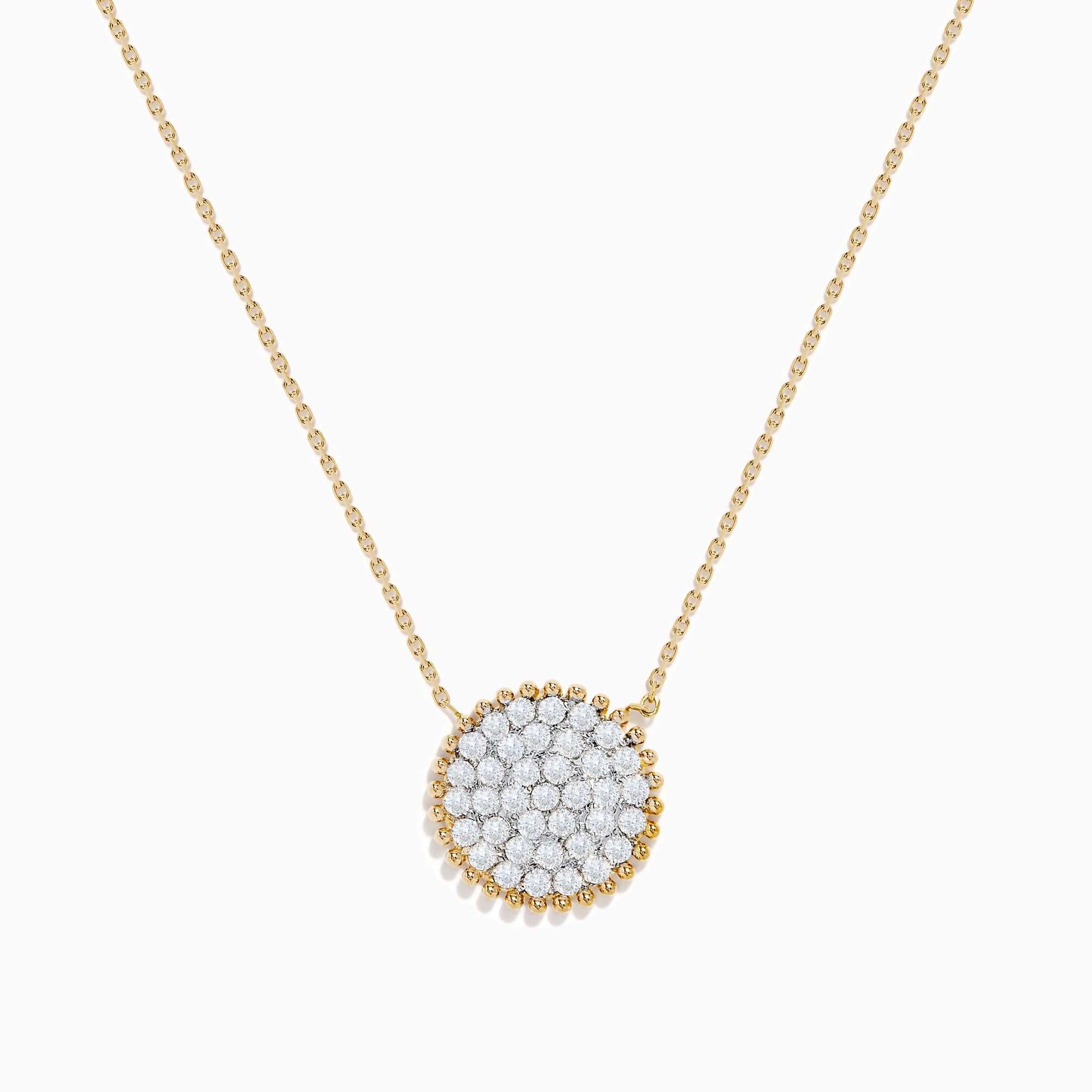 Elegant and minimalistic, the DOro 14K Yellow Gold Diamond Cluster Disc Necklace features a thin chain and a round pendant with sparkling diamonds, bordered by a delicate gold beaded edge.