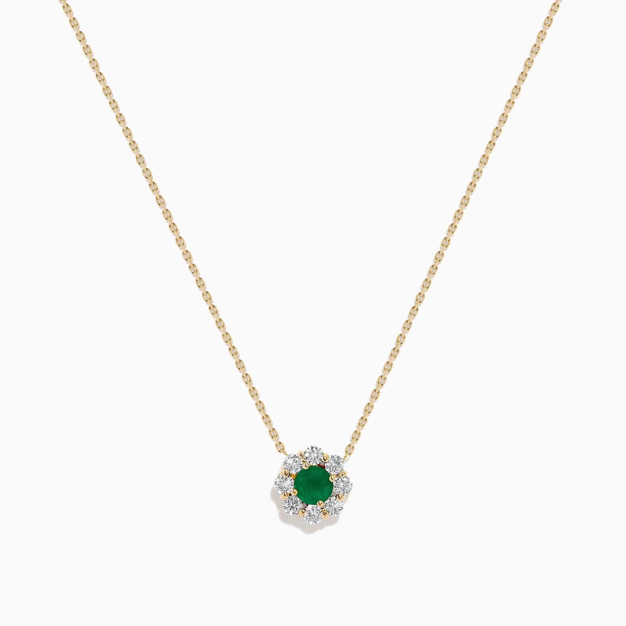 The Brasilica 14K Yellow Gold Emerald and Diamond Necklace features a round green emerald pendant with sparkling diamonds in a flower shape, set in white metal on a delicate gold chain.