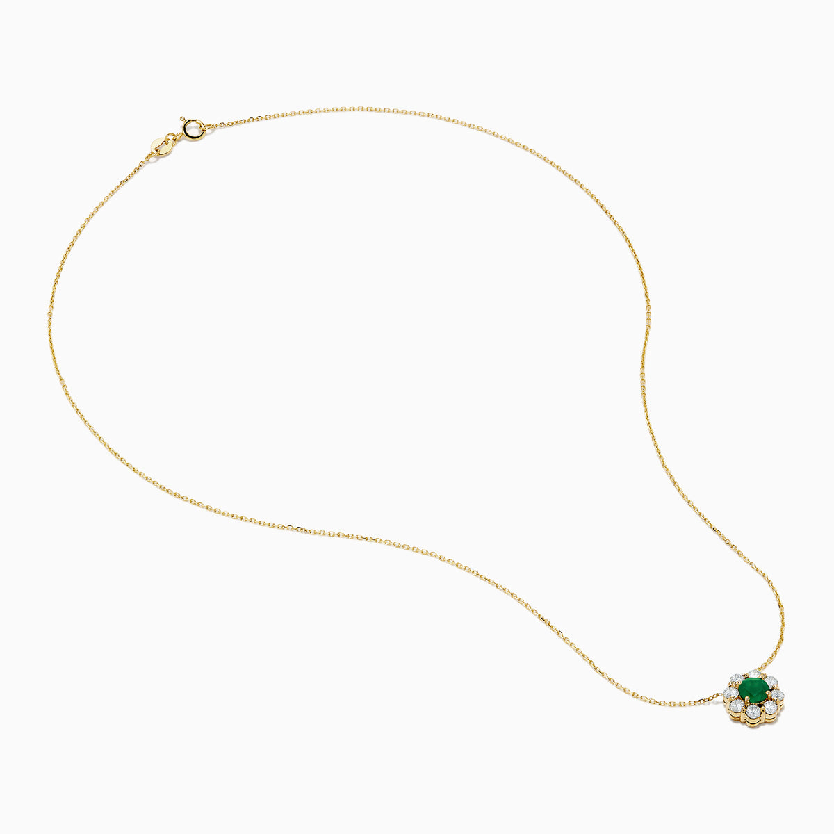 The Brasilica 14K Yellow Gold Emerald and Diamond Necklace features a round green emerald pendant with sparkling diamonds in a flower shape, set in white metal on a delicate gold chain.
