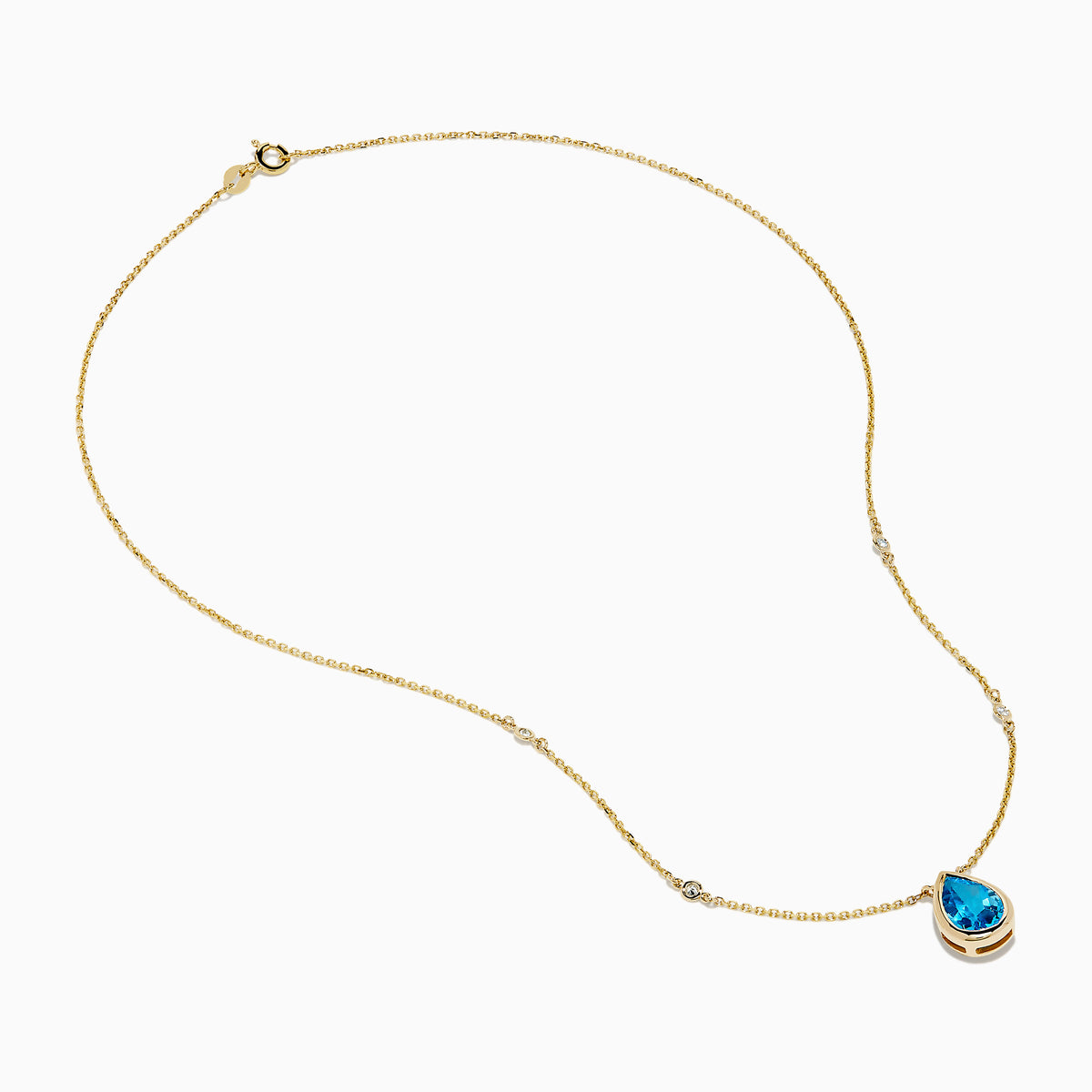 The Ocean Bleu 14K Yellow Gold Blue Topaz and Diamond Necklace features a teardrop blue topaz pendant with two round diamonds set on a delicate chain, shown on a white background.