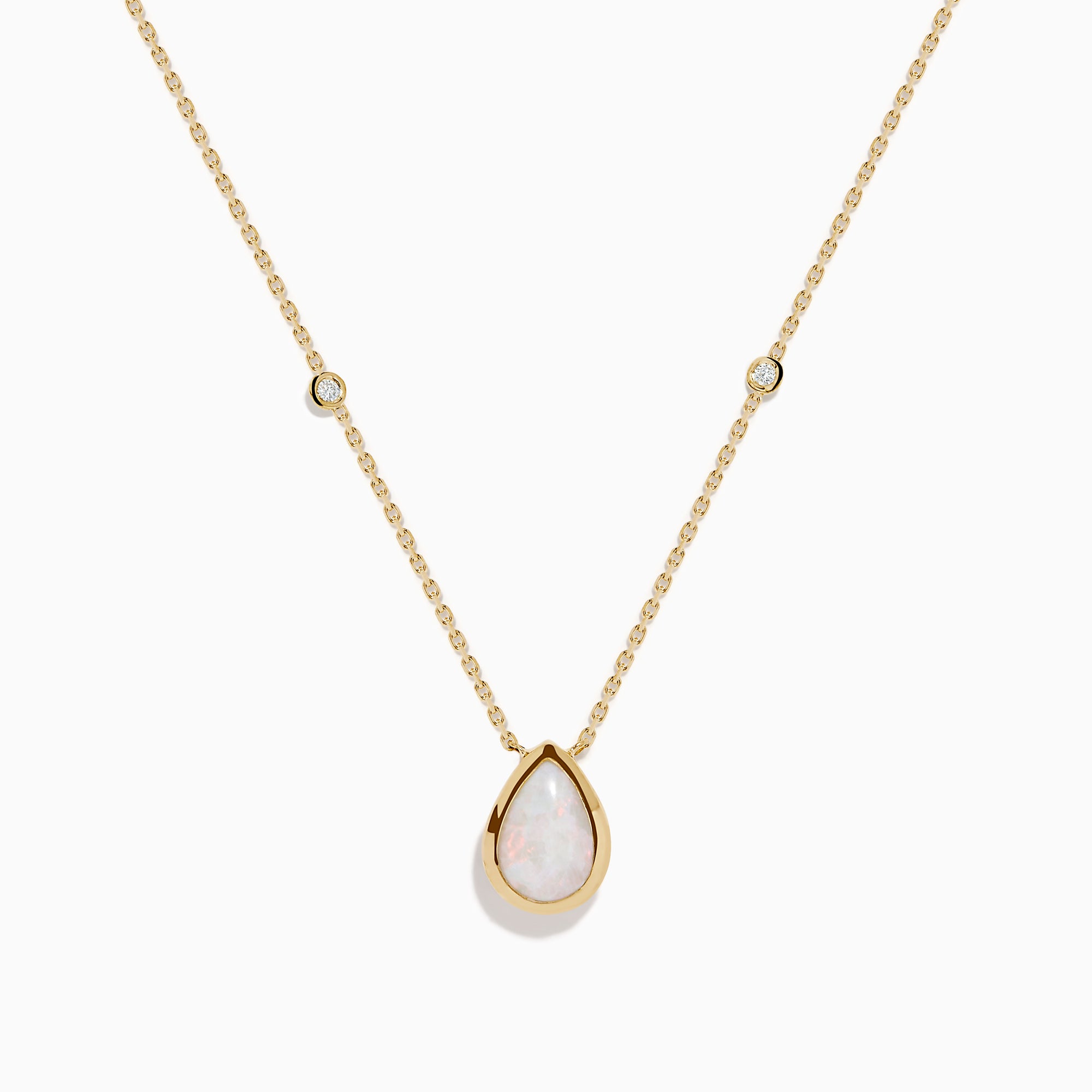 The Aurora 14K Yellow Gold Opal and Diamond Necklace showcases a teardrop opal pendant accented by two round diamonds, offering an elegant look with subtle diamond details.