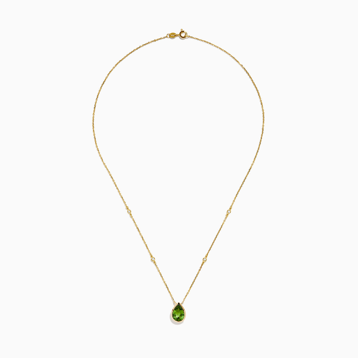 The 14K Yellow Gold Peridot and Diamond Necklace features a delicate gold chain with a teardrop-shaped green peridot pendant and two small round diamonds set along the chain.