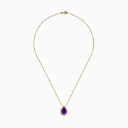 A 14K Yellow Gold Amethyst and Diamond Pear Pendant is shown against a white background, featuring a pear-shaped amethyst bordered by small round diamonds on a yellow gold chain.