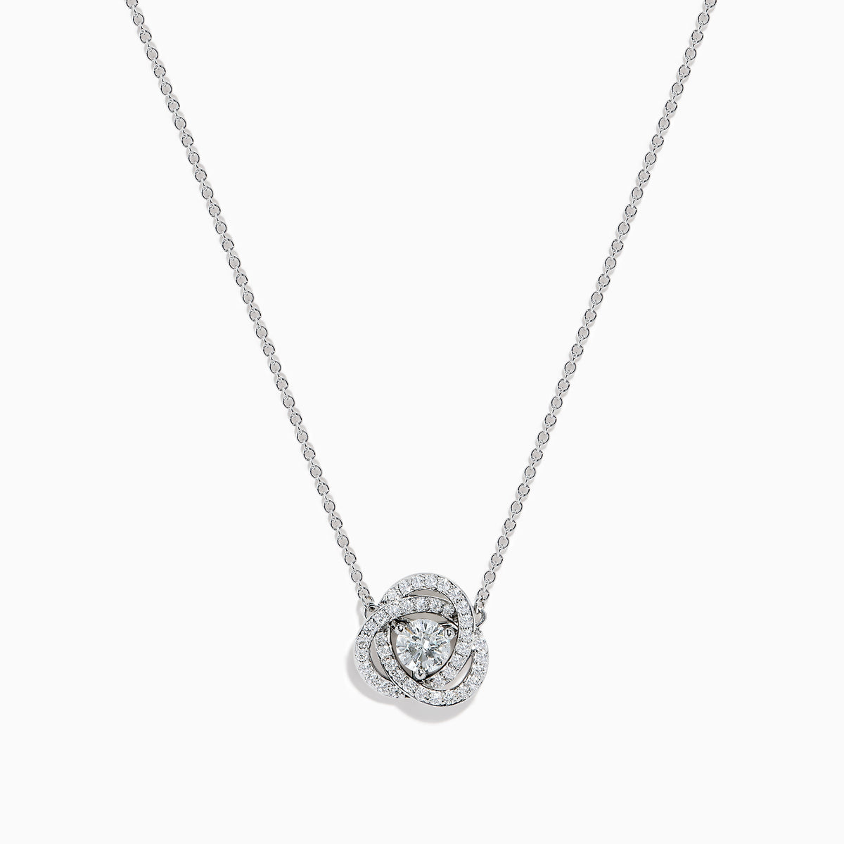 The 18K White Gold Diamond Love Knot Necklace features a central round diamond pendant encircled by intertwining loops of smaller diamonds in a stunning knot-inspired design.