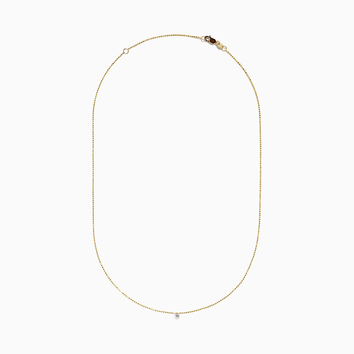 The 14K Yellow Gold Floating Diamond Solitaire Beaded Chain Necklace showcases a small round diamond pendant at the center, set against a plain white background.