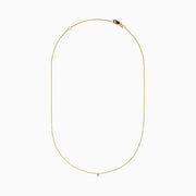 The 14K Yellow Gold Floating Diamond Solitaire Beaded Chain Necklace showcases a small round diamond pendant at the center, set against a plain white background.