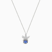 The 925 Seaside Sterling Silver Diamond and Tanzanite Starfish Pendant features a delicate chain and a starfish-shaped design accented with small diamonds and a round tanzanite gemstone at the center.