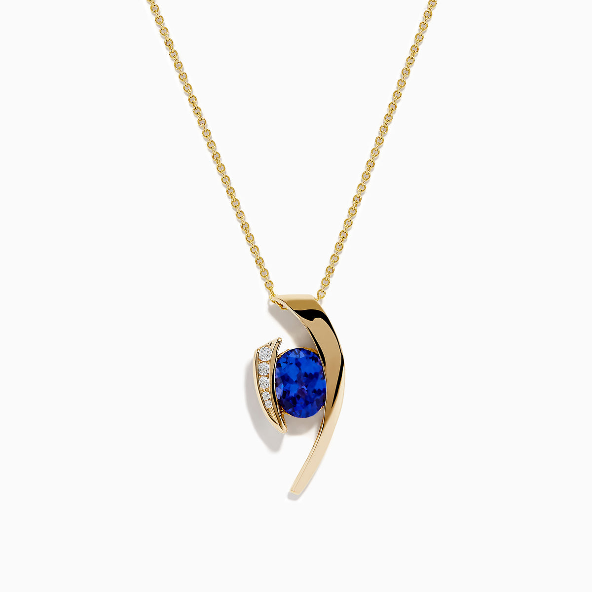 The Nahla Siri 14K Yellow Gold Floating Tanzanite and Diamond Pendant features a vibrant tanzanite gemstone and sparkling diamonds set in a curved gold pendant, displayed on a classic gold chain against a white background.