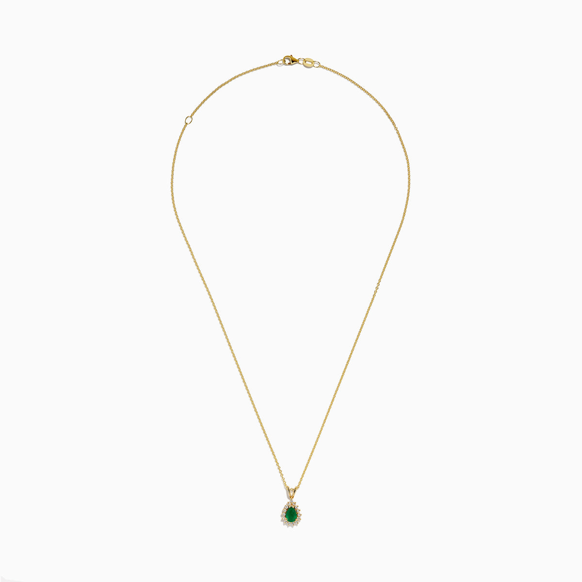 The 14K Yellow Gold Emerald and Diamond Pear Halo Pendant features an emerald teardrop surrounded by a diamond halo, set on a gold chain.