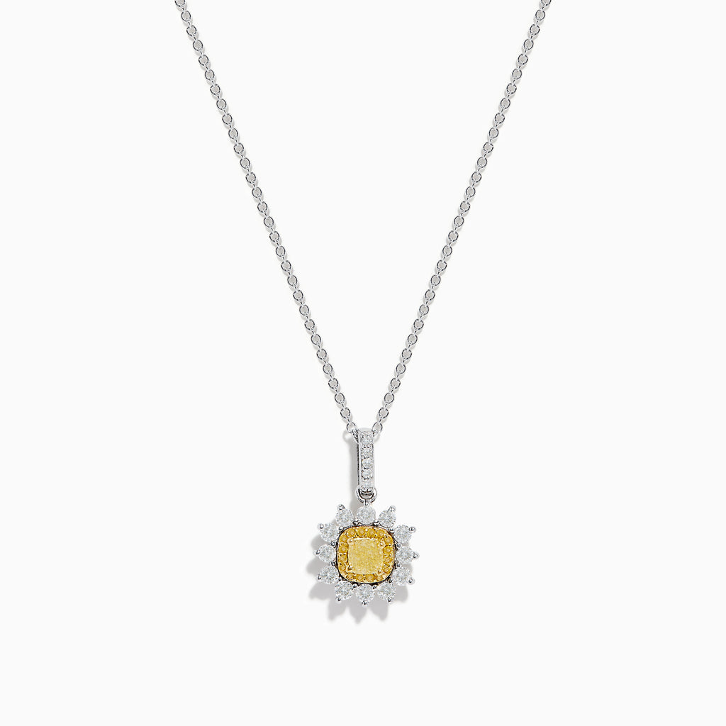The Canare 18K Two Tone Gold White and Yellow Diamond Pendant features a yellow diamond framed by a halo of white diamonds, set on a fine chain.