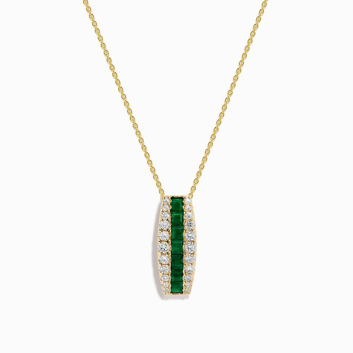 The 14K Yellow Gold Emerald and Diamond Pendant features a vertical row of emeralds flanked by diamonds, hanging from a delicate gold chain against a white background.