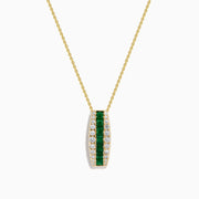 The 14K Yellow Gold Emerald and Diamond Pendant features a vertical row of emeralds flanked by diamonds, hanging from a delicate gold chain against a white background.