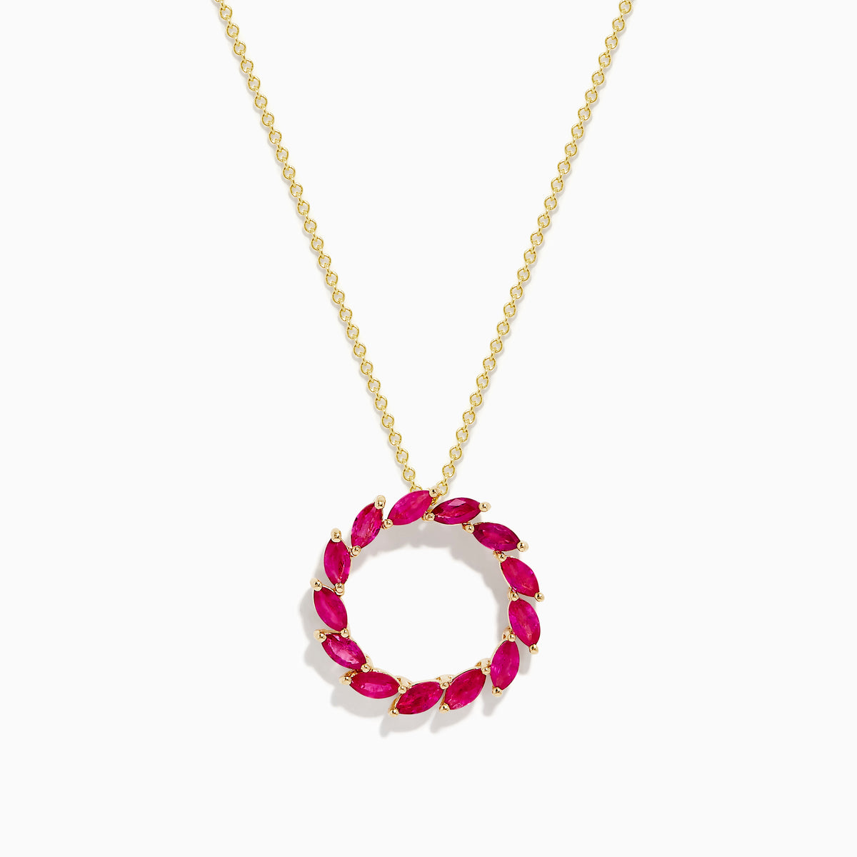 The Ruby Royale 14K Yellow Gold Marquise Cut Ruby Circle Pendant features a circular design with marquise-cut rubies in a wreath-like arrangement.